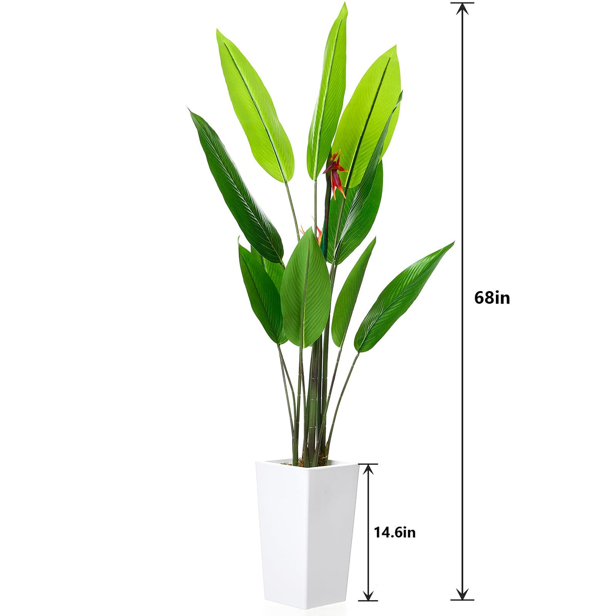 Planta artificial Ave del Paraíso Garvee decorando un rincón del salón con estilo tropical